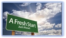 Road sign with text reading, 'A Fresh Start Just Ahead'
